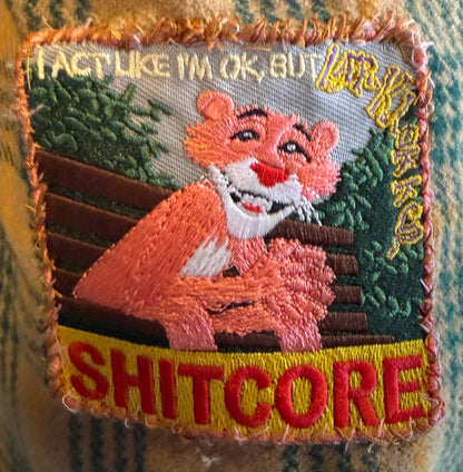 Shitcore laer-klokken patch on fabric